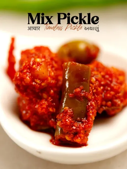 Our timeless Mix Pickle, a delicious medley of different vegetables and fruits pickled in a rich, spicy masala. It's a classic that offers a variety of textures and flavours in one bite.