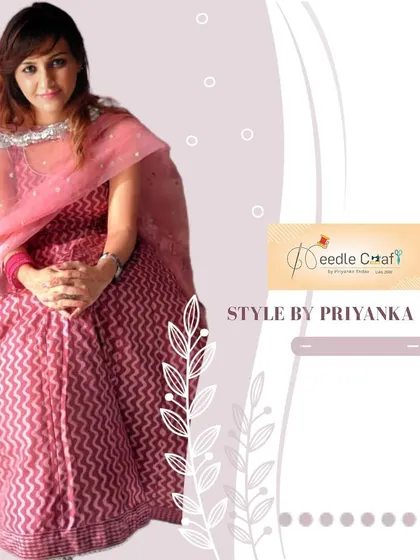 A lovely pink lehenga featuring a chevron-print fabric. We can work with any fabric you bring to create an outfit that reflects your personal style.
