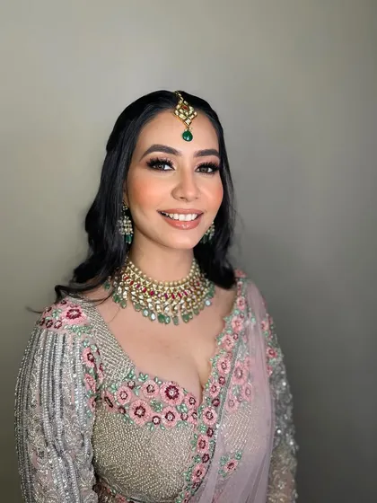 Amanpreet's happy smile is the best accessory. Her makeup was designed to make her feel confident and beautiful.