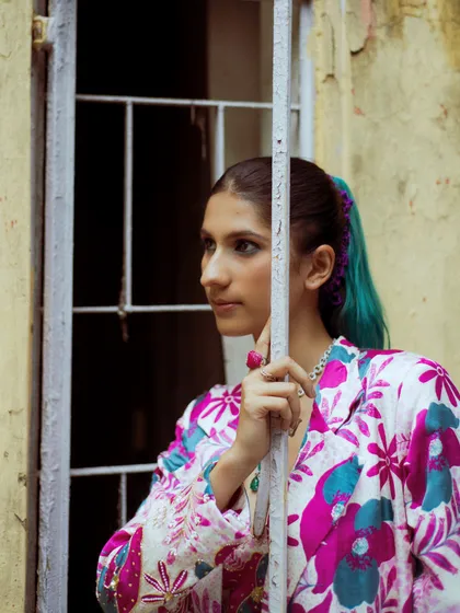 A close-up portrait from the print-on-print look. My styling is about creating a complete character, from the outfit and accessories right down to the hair and makeup.