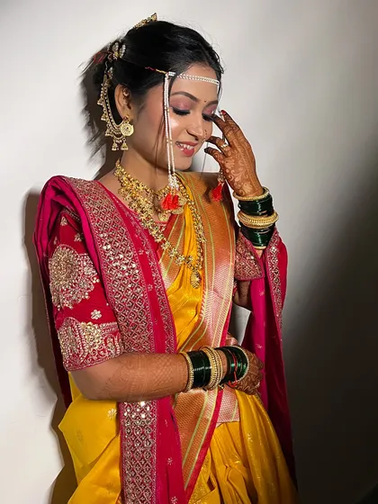 A happy, candid moment with my bride Sayali. Her natural glow is enhanced with a minimalist makeup approach, perfect for a traditional wedding.