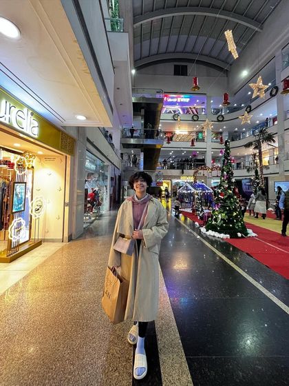 A little Christmas shopping in my favorite trench coat. It's the perfect versatile piece for the winter season.