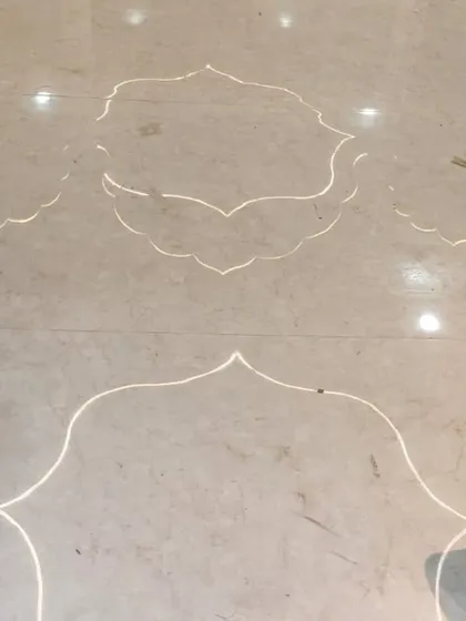 True luxury lies in the details. Here, I designed a custom floor where light itself is inlaid into the marble, tracing patterns inspired by traditional Indian motifs. This technique transforms the floor into a unique, glowing art piece.