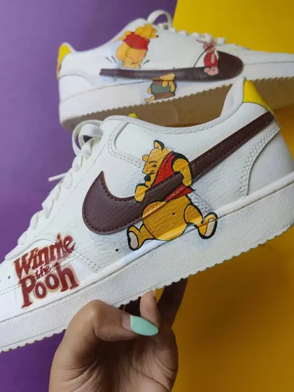 A wholesome custom featuring Winnie the Pooh and his friends on a pair of Nike Court Visions. I love how the characters are interacting with the swoosh. It’s a simple, happy design that’s guaranteed to make you smile.