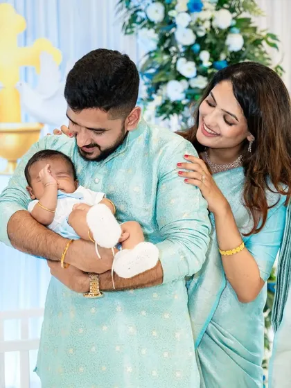 A tender moment from a newborn baby's naming ceremony. We are experienced in covering quiet, intimate family functions with sensitivity, ensuring we capture the emotion of the day.