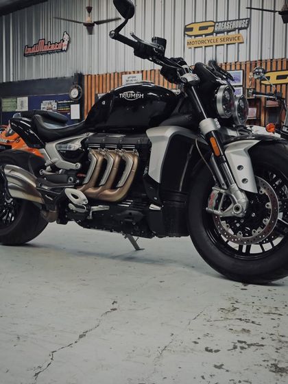 The Triumph Rocket 3, a 2500cc monster of a motorcycle, in our garage.