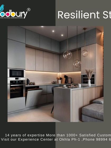 Resilient style is about using durable materials in a timeless design. This concept shows a modern kitchen with a mix of grey and wood-textured cabinets that is built to last.