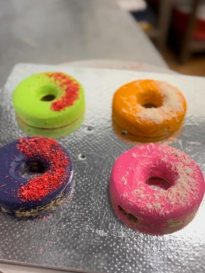 A set of four colorful Holi dognuts, ready to bring joy to a lucky pup. They are available in both our Bengaluru and Mumbai bakeries.