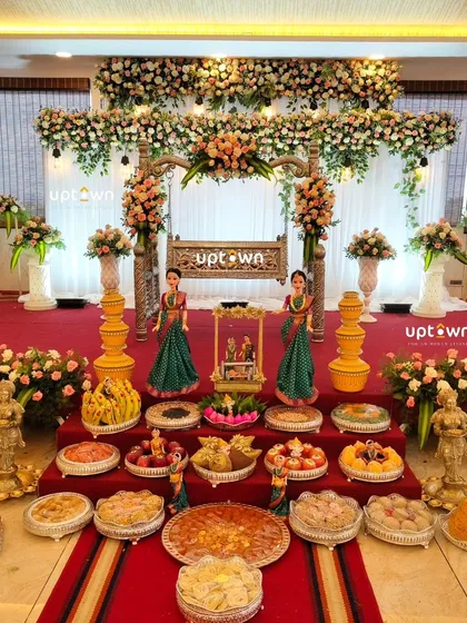 For traditional events like a naming ceremony, we create an atmosphere of grace and celebration. This stage includes a beautifully decorated floral cradle, an elaborate display of traditional sweet's and fruit's, and classic doll's, all set against a backdrop of fresh flower's.