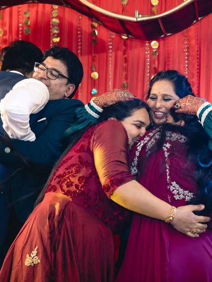The result of a successful family performance is pure joy. These photos capture the happy, candid moments of a family celebrating together on stage after their dance.