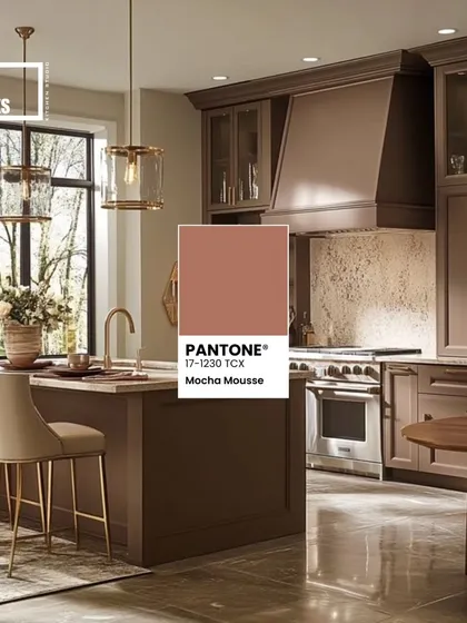 Another take on Mocha Mousse, used here for classic shaker-style cabinets in a spacious kitchen with an island.