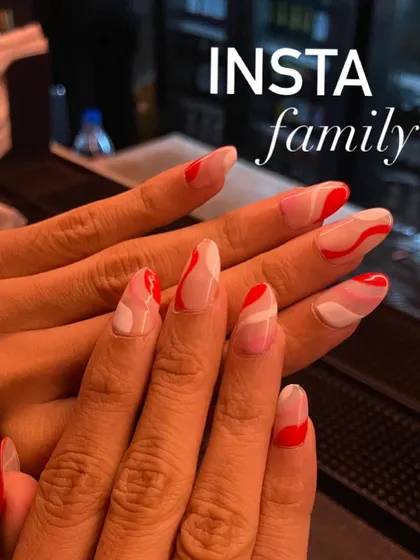 Thank you to my Insta family for all the love. This picture showcases a beautiful red and white abstract swirl design that is one of my favorites to create.