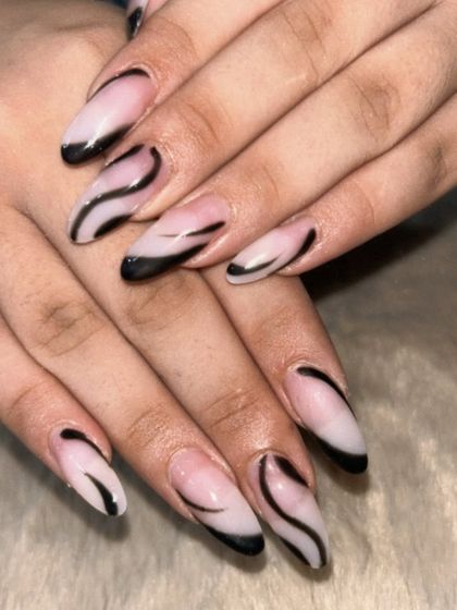 A modern and artistic design with abstract black swirls on a milky white base.