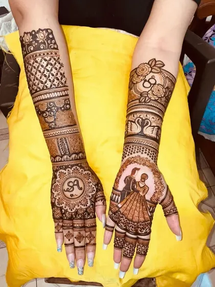 A design featuring the initial 'A' in a mandala on one hand and a couple portrait on the other.