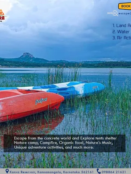 Escape the concrete world. Our kayaks rest by the shore, ready for you to explore the lake with its beautiful mountain backdrop.