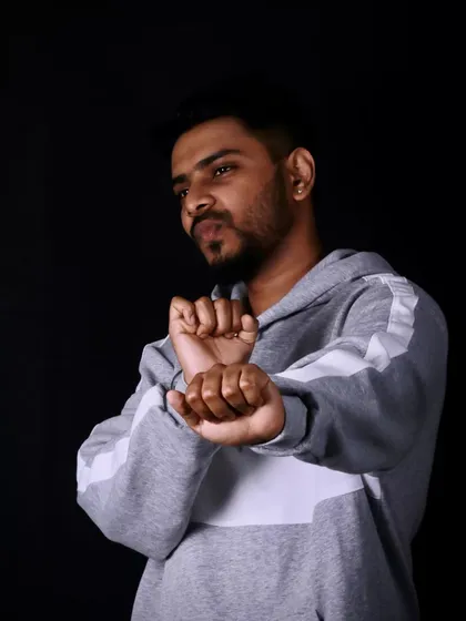 A shot from a fun portfolio shoot. While my main focus is the music, I believe in presenting a complete artist persona, which includes a strong visual style.