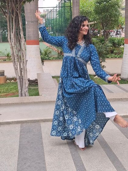 Another angle of the same flowing, graceful dance pose.