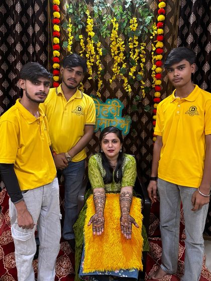My team and I with a happy bride. Seeing our clients smile with their beautiful mehndi is the best part of our job.