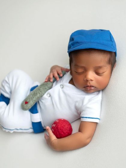 For the family of cricket fans! This little batsman is all ready for his first game, complete with a tiny bat, ball, and cap.