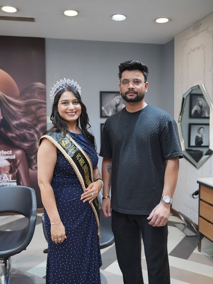 Our client posing with one of our senior stylists. We pride ourselves on having a team of experienced professionals who are experts in their craft.