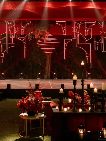 The stage backdrop for 'Laal Bagh' was a modern, artistic interpretation of architectural ruins, outlined in red neon. This piece blended my love for historic Indian forts with a contemporary, edgy aesthetic.
