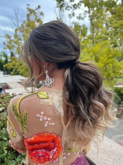 Another angle of the Mehandi ponytail, showing how it keeps hair off the back while still looking full.