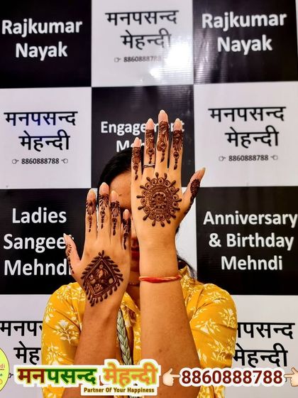 A student showing the beautiful mandala and geometric patterns she learned to create in our class. These designs are perfect for learning about symmetry and detail.