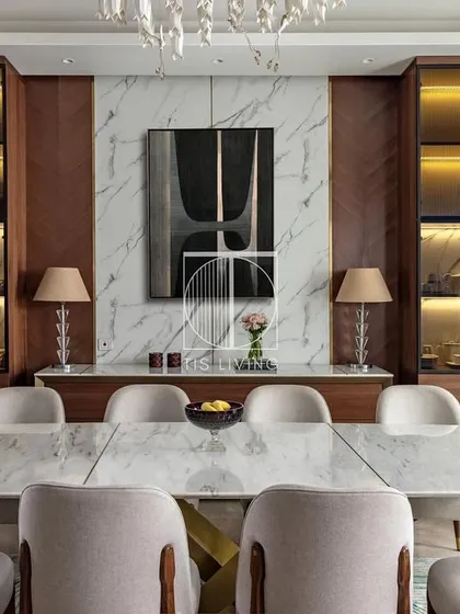 We specialize in the complex engineering required for luxury furniture. This dining table features a hand-sculpted gold brass base supporting a heavy Michelangelo stone top. We also applied a special 4-layer protective coating to the stone, making it stain-resistant without compromising its natural beauty, ensuring it's as practical as it is elegant.