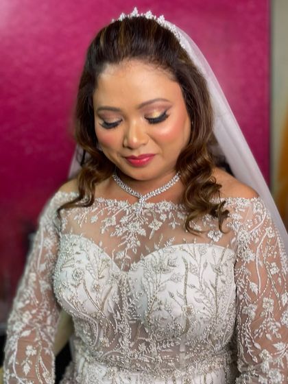 A dreamy white wedding calls for a dreamy bridal look. For this bride's big day, we focused on soft, romantic makeup with glowing skin and a subtle shimmer on the eyes to match her gorgeous gown.