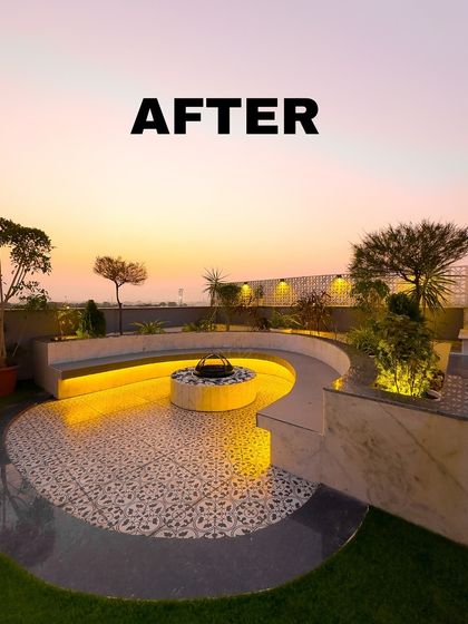 A beautiful sunset view of the completed fire pit lounge. The curved seating, patterned tiles, and warm lighting create an incredibly inviting atmosphere for evening gatherings.