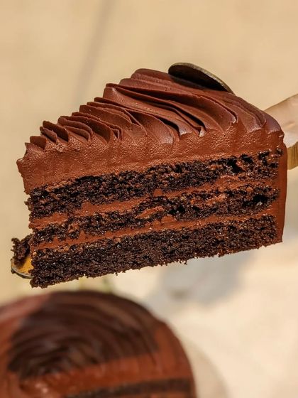 The layers of our Belgian Dark Chocolate cake speak for themselves. Rich, velvety ganache is sandwiched between our signature moist chocolate sponge for a pure chocolate experience.