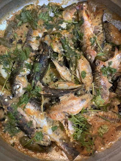 A pot of fresh water fish curry, a simple and light dish.