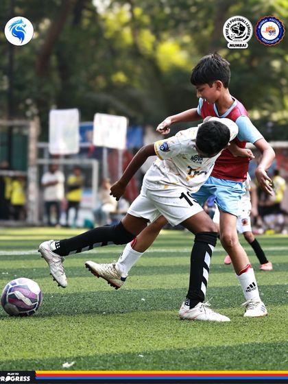 A strong but fair challenge. Players learn to use their strength and balance to win possession.