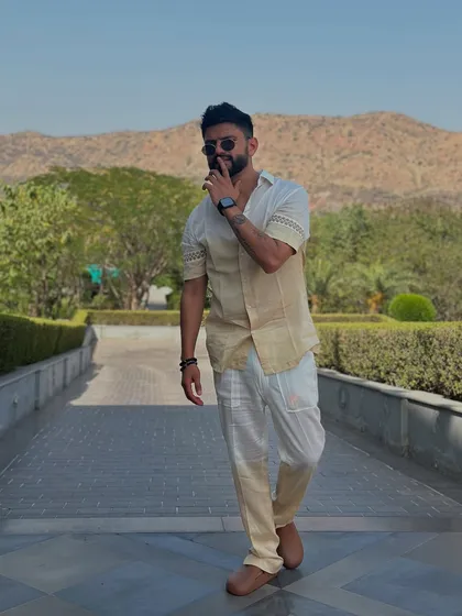 A candid, smiling shot in my stylish outdoor attire. Just enjoying the moment.