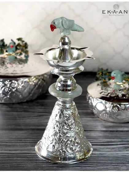 Intricately crafted and full of character, this standing diya from my Jade Parrot collection is a statement of beauty and tradition. The jade parrot adds a unique and auspicious touch.