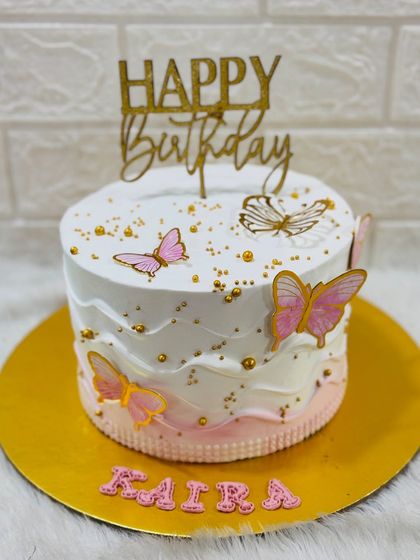 Another angle of the popular pink butterfly cake, a favorite design for all ages.
