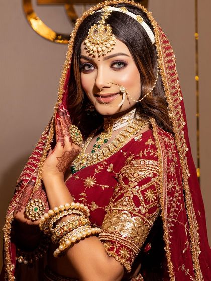 A happy bride is the most beautiful bride. This look features a warm, glowing base, subtly defined eyes, and a smile that says she's ready for her big day.