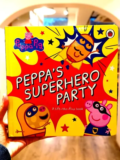 This Peppa Pig 'Superhero Party' book is a lift-the-flap adventure, perfect for little fans of the show.