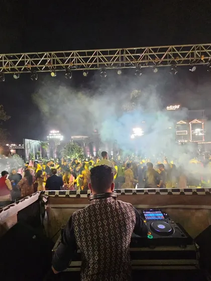 This is the view I live for. From my console, I see the energy build until the entire dance floor is one single vibe. This is my goal for every Sangeet, reception, or party I play.