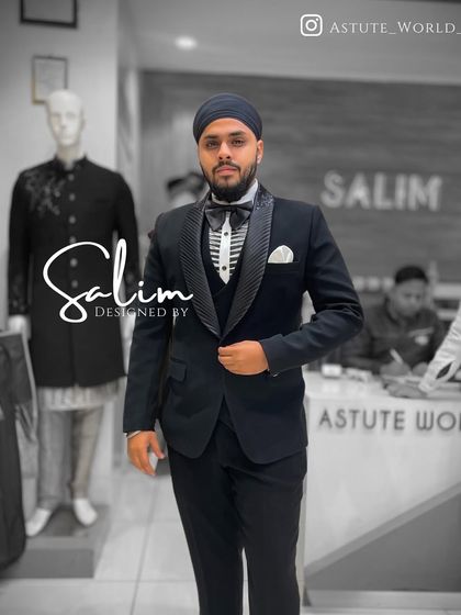 A client in a classic three-piece tuxedo with a pleated lapel. The attention to detail in the lapel and the fit of the waistcoat showcases my commitment to quality.