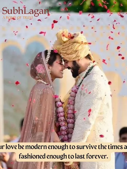 A couple shares an intimate moment, their foreheads touching, amidst a shower of petals. We aim to find partners who share both modern sensibilities and timeless values.