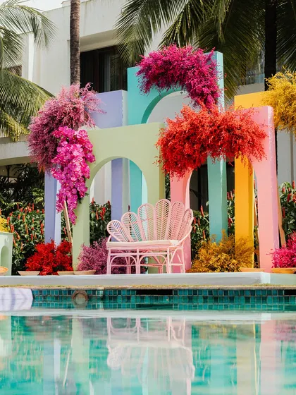 Welcome to the fun side. I designed this vibrant, poolside carnival mehendi at the W Goa, using a riot of color, playful structures, and tropical florals to create an atmosphere of pure joy and celebration.