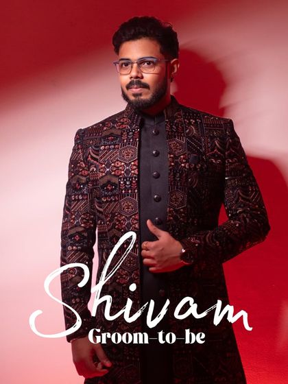 A stylish portrait of the groom-to-be, Shivam, looking sharp and ready for his big day in a modern, embellished jacket.