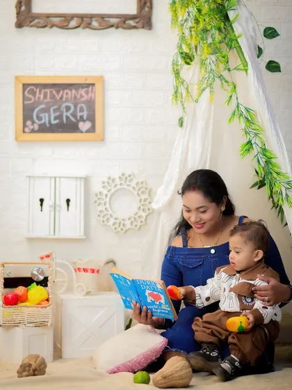A mother and her son sharing a book in our boho-chic tent. The natural elements and soft lighting make for sweet, intimate portraits.