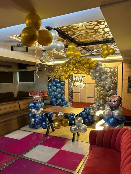 A wide shot of the Boss Baby party, showing how the decorations were arranged to create a stylish lounge area for the celebration.