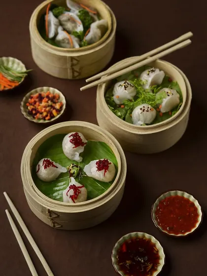 Serving up dim sum that’s as photogenic as it is delicious. Our bamboo steamers are filled with delicate dumplings, ready to be enjoyed with our house-made dipping sauces.