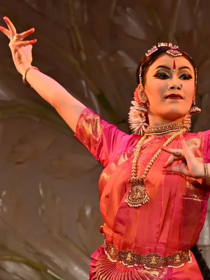 Expressive eyes and intricate hand gestures are the hallmarks of abhinaya. This close-up of Stuti Mukherjee during her debut performance showcases her ability to communicate emotion and narrative.