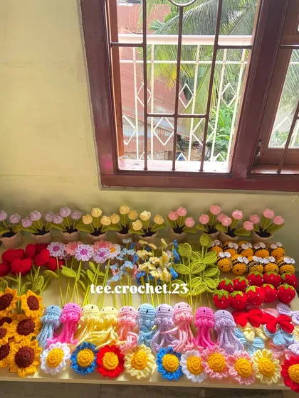 The full display of a large custom order, featuring a wide range of my playful amigurumi characters.
