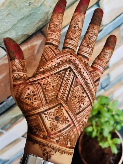 The stain of the geometric back-hand design, captured outdoors. The deep red-brown color shows the quality of the organic henna I use.