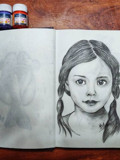 This pencil sketch of a young girl was about capturing innocence and wonder. I find that drawing children requires a delicate touch to get the soft features just right.